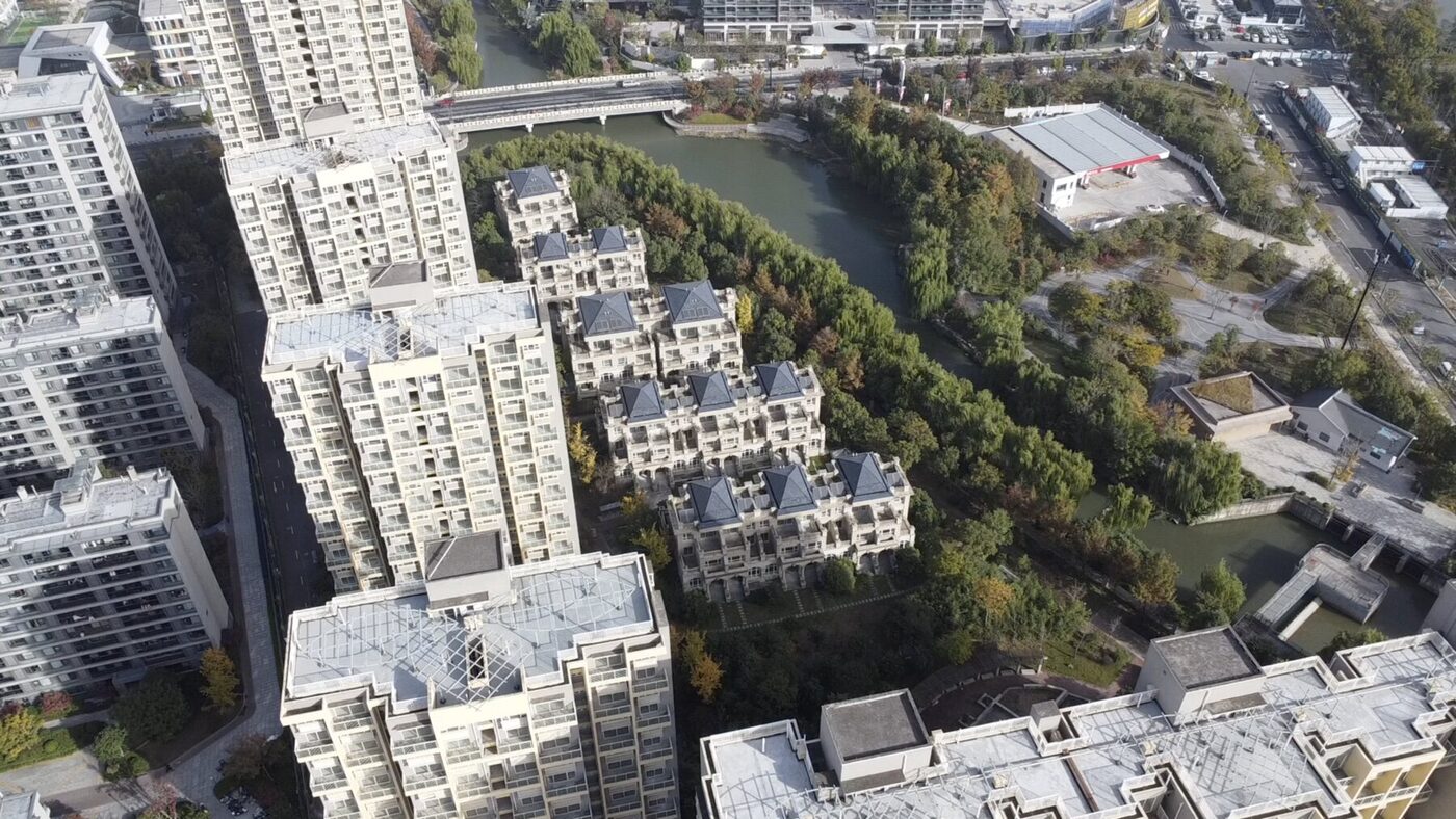 Apartment buildings, houses and the river
